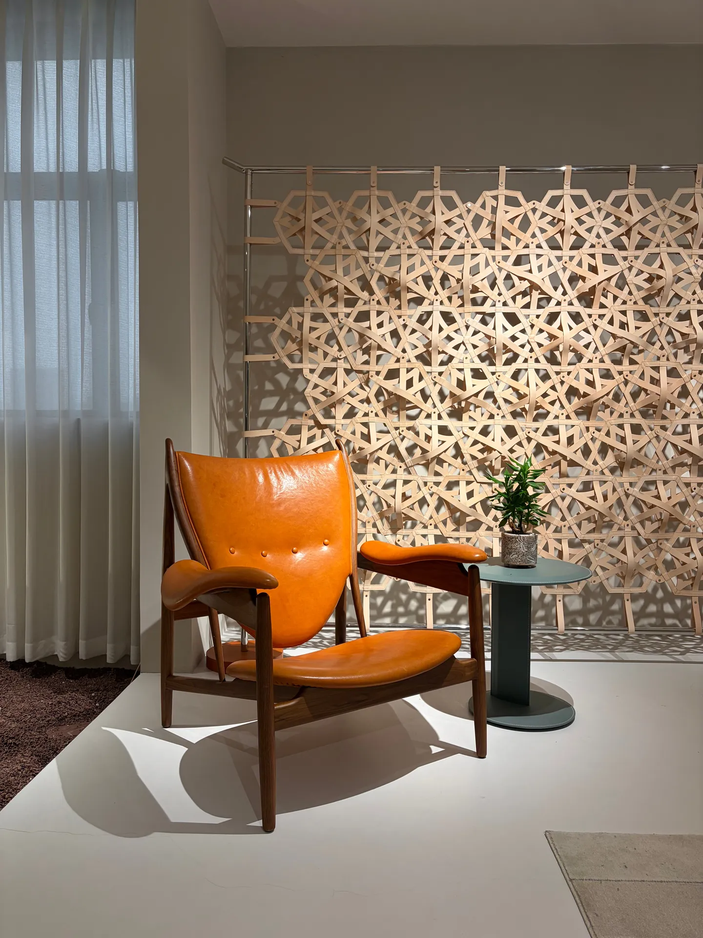Lounge chair chieftain orange leather 001 on display at EvergoCasa's Foshan showroom - mid century modern apartment project ideas