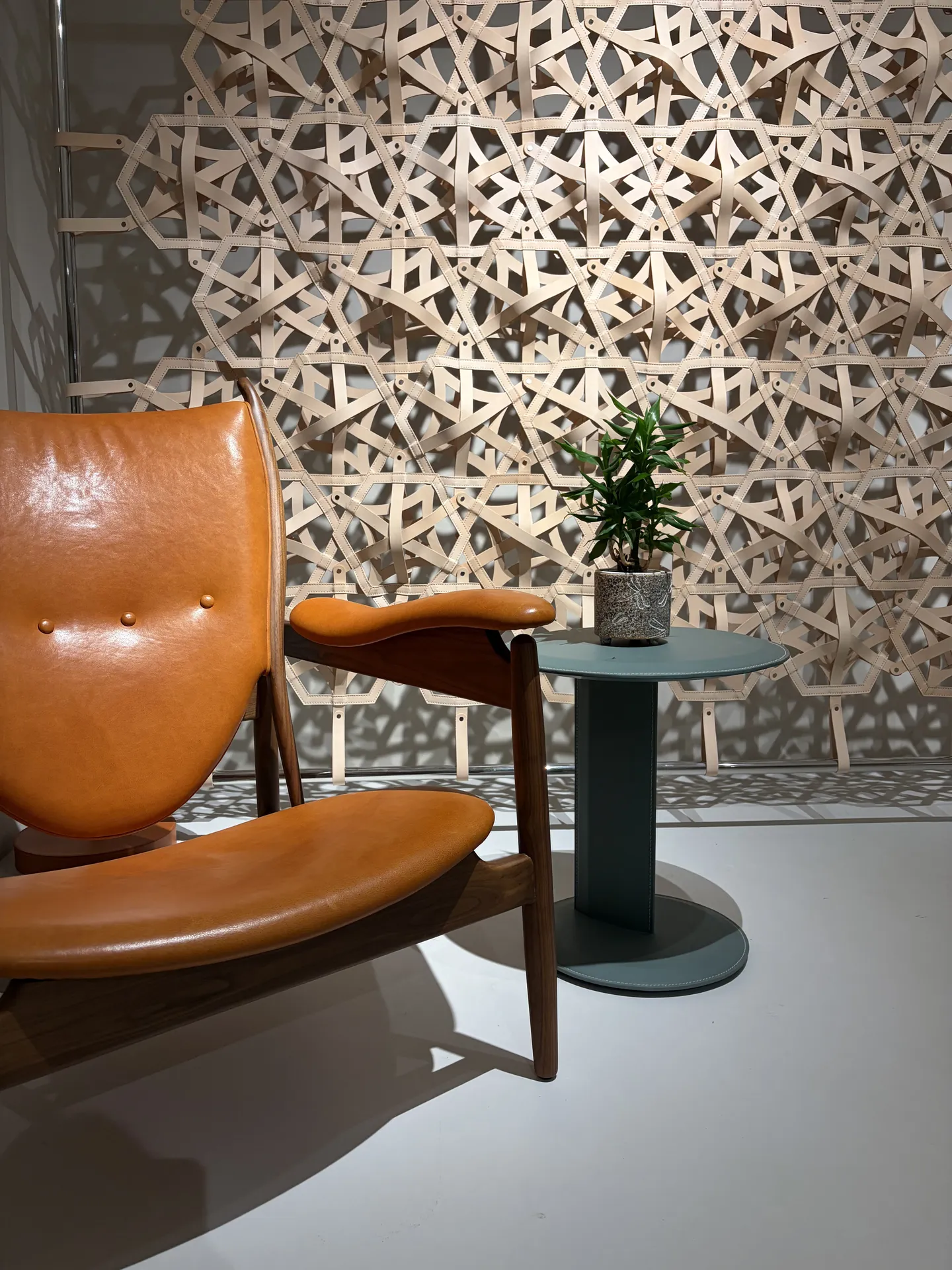 Lounge chair chieftain orange leather 003 on display at EvergoCasa's Foshan showroom - wall decoration project ideas
